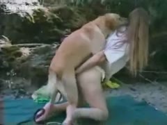 Excited dog mounts his undressed owner and copulates her